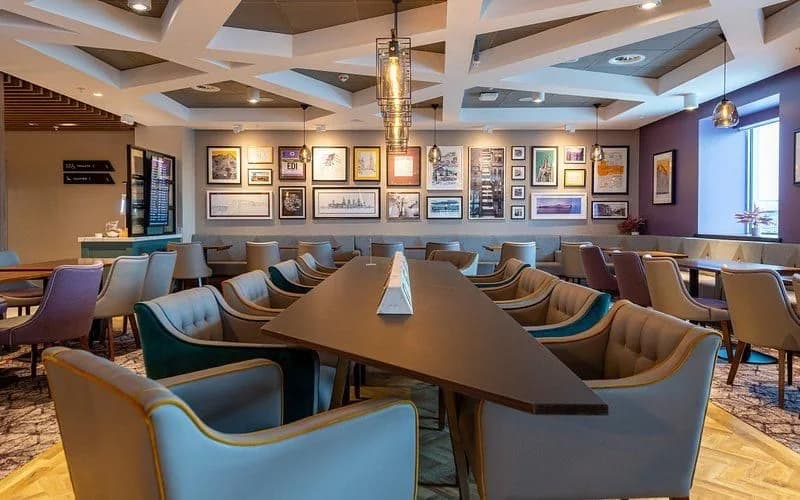 Finished seating and dining area inside the Aspire Lounge